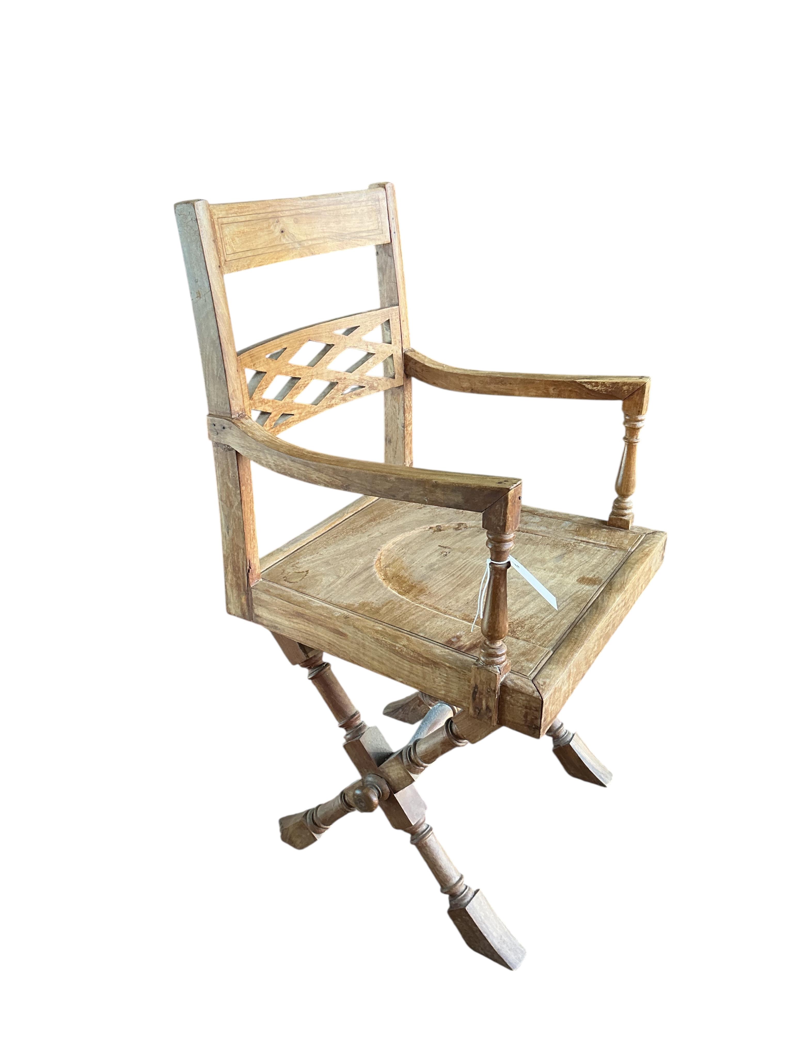 A 19th century Anglo Indian teak campaign chair, width 49cm, depth 47cm, height 92cm